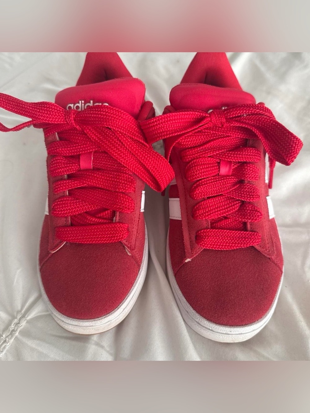 Woman’s  6.5 red Adida campuses
